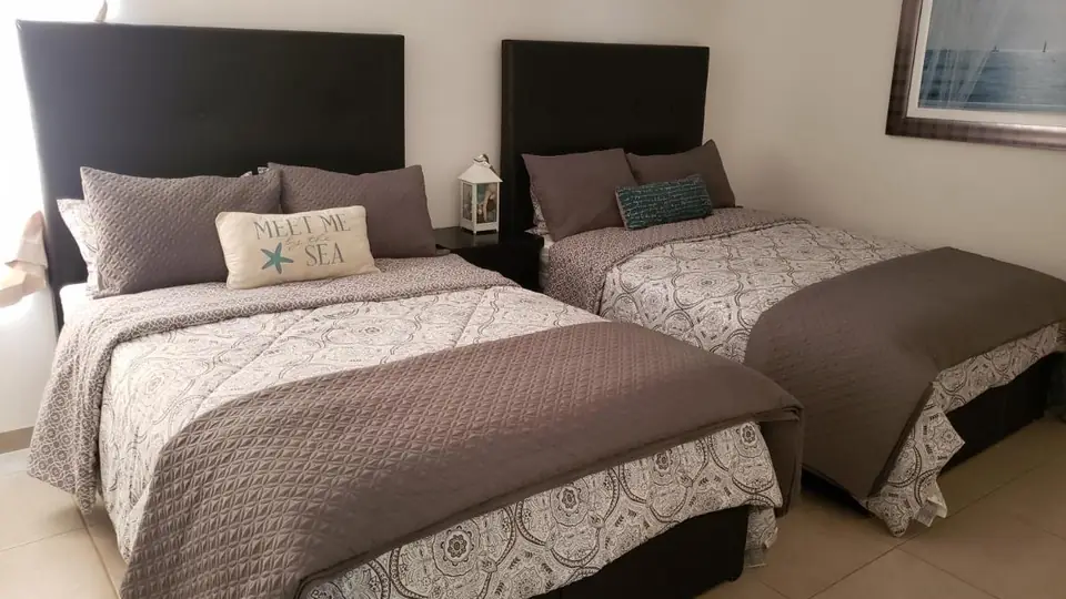 Two-Bedroom Apartment at Corona Del Sol, bedroom with two double beds